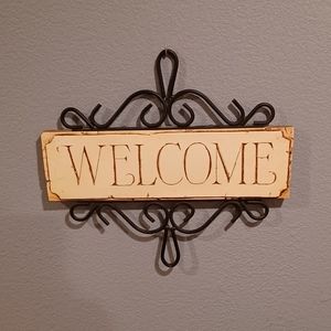 Welcome sign in Italian style artist Pisano